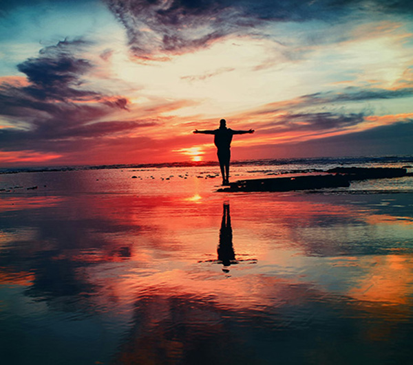 Standing on the beach img